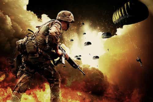 a soldier with a gun a soldier with a gun in front of a fire and smoke